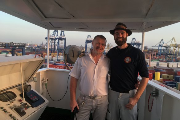 Thor Pedersen (right) aboard a cargo ship.