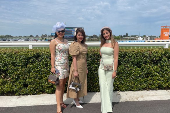 Racegoers Negin Yazdani, Fahi Taba and Farnaz Taba.