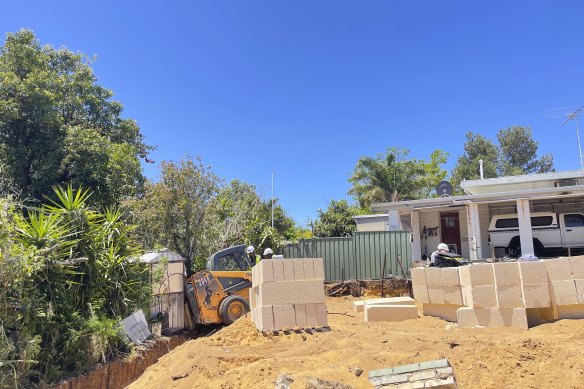 WorkSafe inspectors at the Medina site where a man was injured on Wednesday morning. He was pronounced dead at Rockingham Hospital soon after.