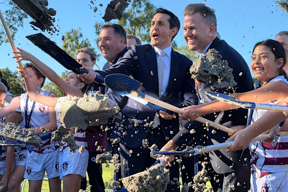Acting Olympic Minister Andrew Powell, Prime Minister David Crisafulli and Deputy Prime Minister Jarrod Bleijie with the ceremony's first turf transformation.