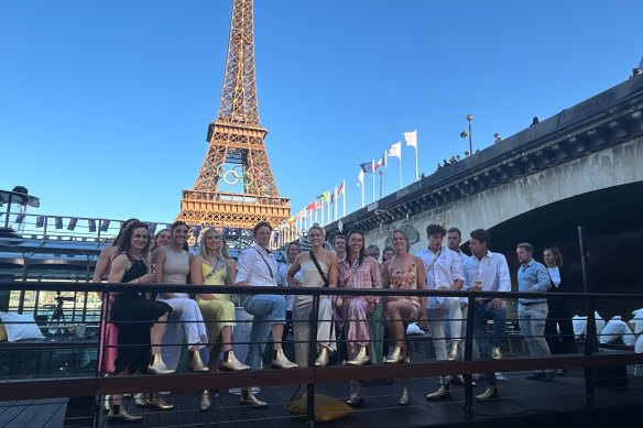 Some of Australia’s Olympic swimming team wearing gold Rossi boots at a party hosted by Gina Rinehart in Paris this month.