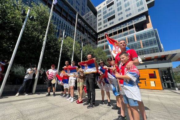 Novak Djokovic supporters outside the Federal Court in Melbourne this morning. 