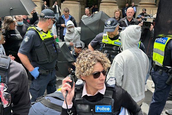 Victoria Police use new search powers at Unite to Oppose the Far Right protest in Melbourne CBD on November 30, 2025.