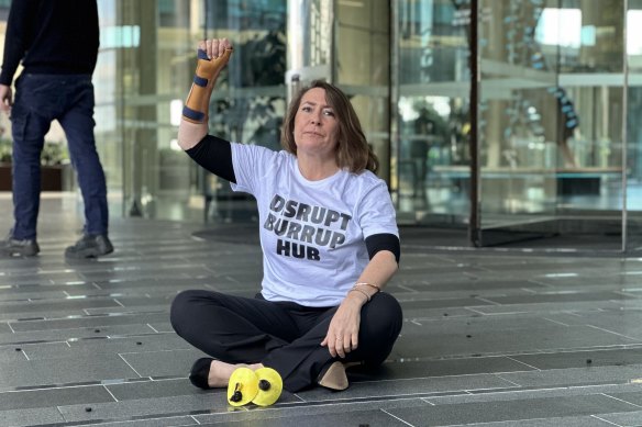 Disrupt Burrup Hub protester Kristen Morrissey outside Woodside’s headquarters on June 1.