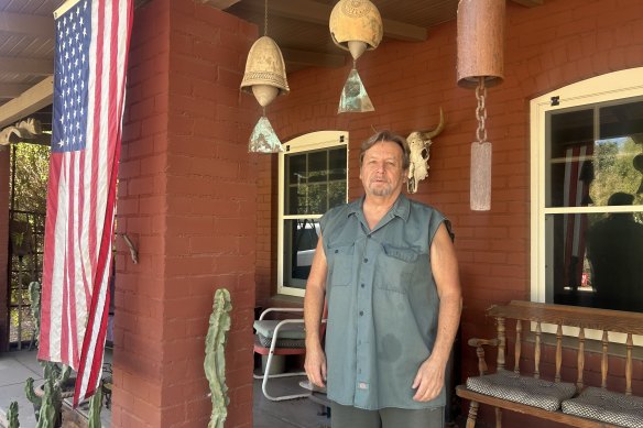 Retired home restorer Tom Niesen of Phoenix, Arizona, who said he supplied most of the Harris-Walz signs on his street.