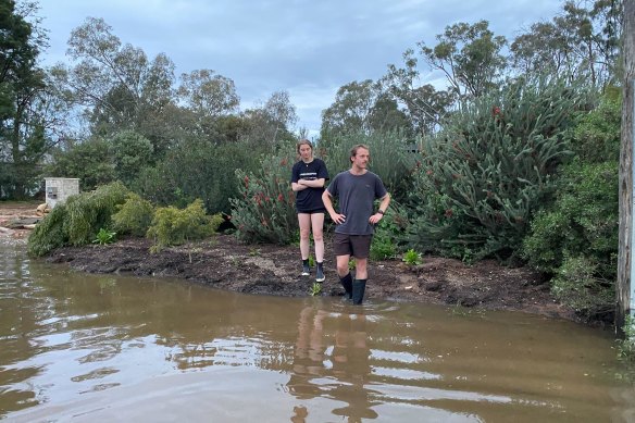 With my sister Greer outside our flooded home in Echuca, on the border of Victoria and NSW.