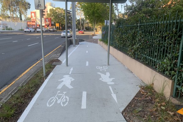 A bike path in Artarmon next to the Pacific Highway is not only too small for two bikes to ride, it’s also got sign posts stuck in the middle.