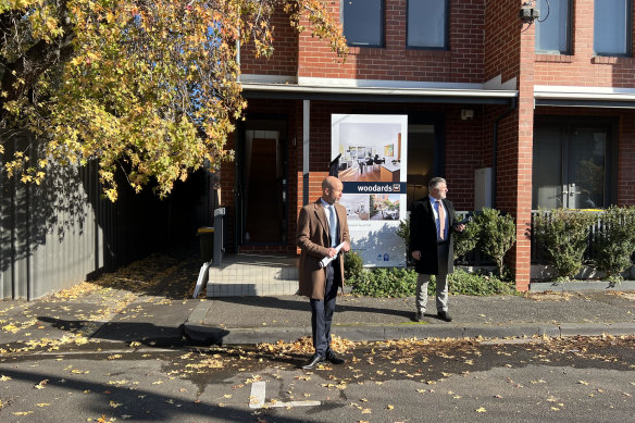 Woodards Carlton partner and auctioneer Glenn Bartlett starts the auction at 11 Sutton Street, Carlton North.