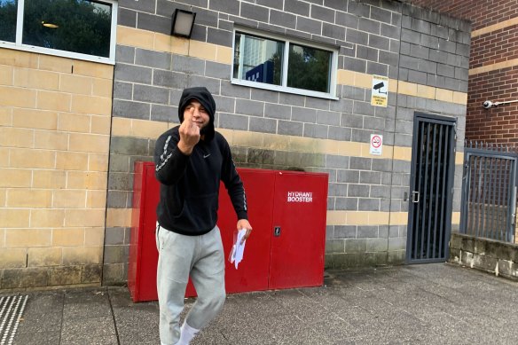 Adam Achrafi after he was granted bail at Burwood Local Court on Wednesday May 25, 2022. Achrafi was arrested as part of Strike Force Sugarcane, a crackdown on alleged members of the Alameddine crime network.