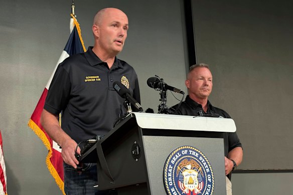 Utah Governor Spencer Cox addresses the media with Utah Valley University police chief Jeff Long.