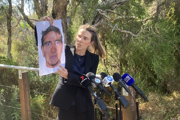 Detective Senior Sergeant Chantal Langthorn, officer in charge of the child abuse squad, with an identikit of the man sought by police.