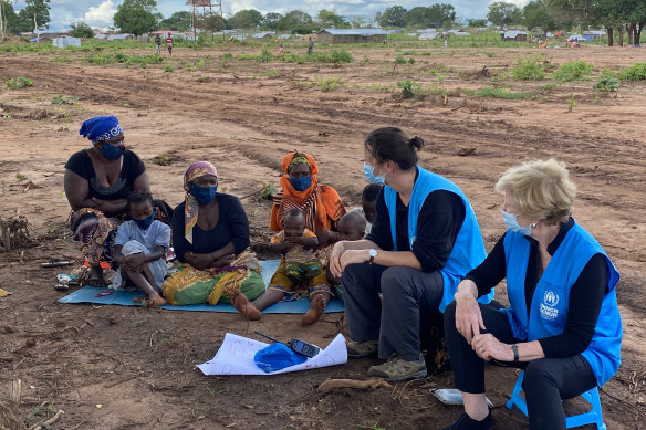 UNHCR’s Assistant High Commissioner for Protection Gillian Triggs (right) holds a focus group discussion with women at the Nanjua B internally displaced persons relocation site in northern Mozambique.