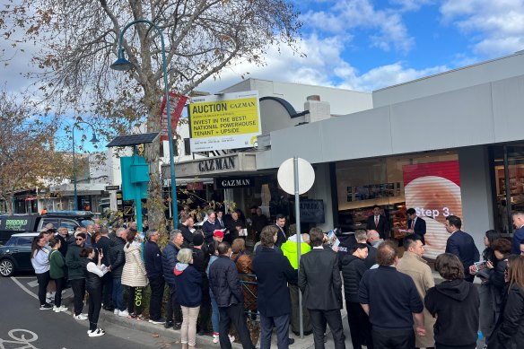 The auction outside 60 Church Street, Brighton last week.