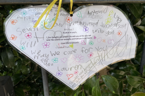 Paper heart tributes were left by students from the nearby St Edmund’s school.