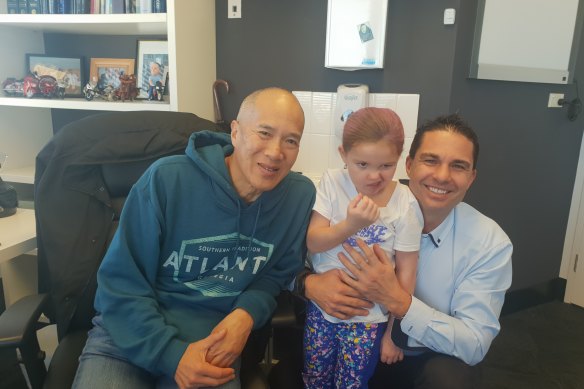 Charlie Teo with Bella Howard and her father Gene.