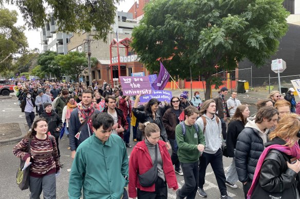 University of Melbourne staff marching through Carlton as part of a strike involving four other universities.