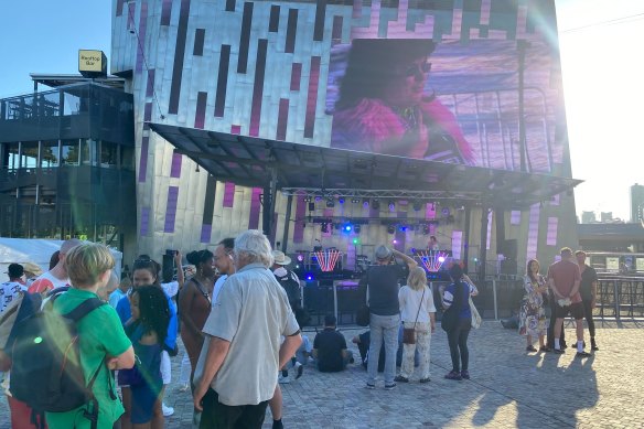 People are beginning to filter into Federation Square in Melbourne. 