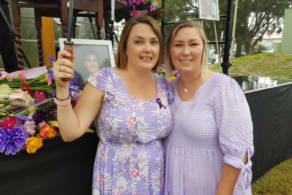 Daughters Shayne Probert (left) and Tabitha Bleys at the service for their late mother in February last year. 