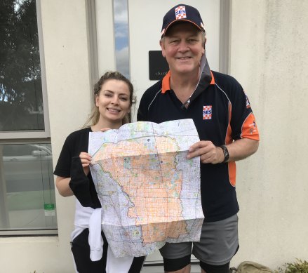 Rob Olifiers and his daughter Sarah upon finishing his trek along all the roads in the Merri-bek council area.