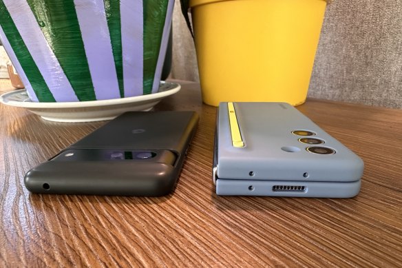 When both have official cases on, the Fold5 (right) is almost twice as thick as the Pixel 7.