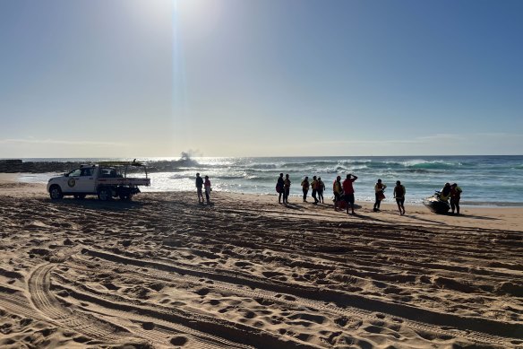 Surf rescue crews on the Central Coast beach as the search for a missing boy co<em></em>ntinues on Wednesday.