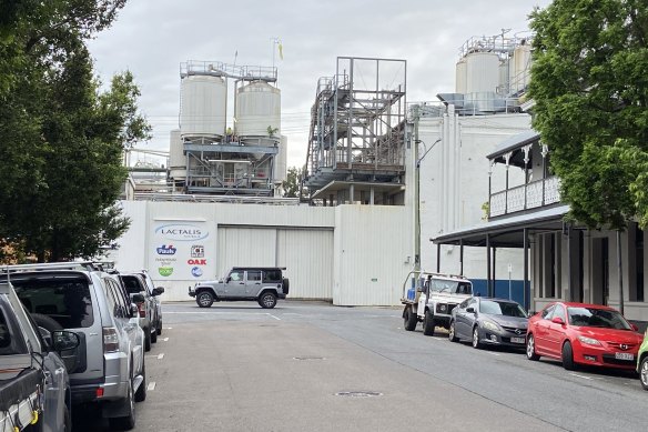 Behind the 70-year-old milk factory in the centre and the pub on the right hand corner is the South Brisbane reach of the Brisbane River.