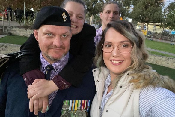 Paul Miller with daughters Sarah and Hayley and son Aaron on Anzac Day 2019.