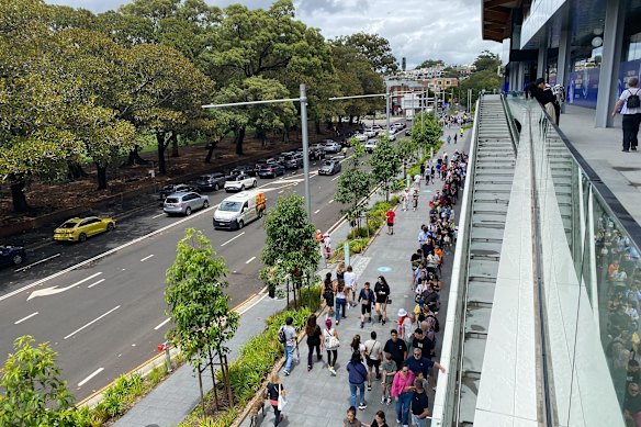 Long lines wrap around the new Sydney Fish Market building just hours into opening day.