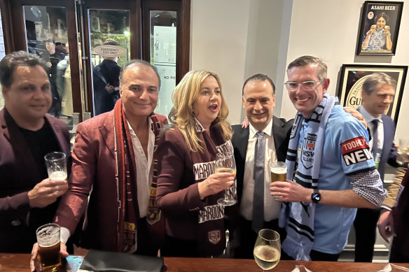 Queensland Premier Annastacia Palaszczuk and NSW Premier 
Dominic Perrottet walked down Caxton Street with Peter V’landys (centre) before Brisbane hosted the State of Origin decider.