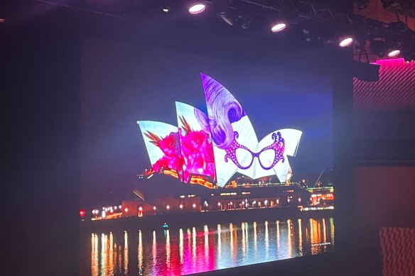 The Sydney Opera House sails lit in honour of Barry Humphries