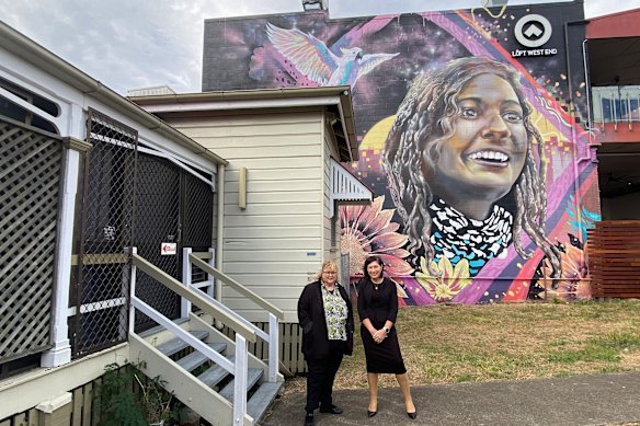Former minister Leeanne Enoch and Karyn Walsh at the old West End Police Station announcing now-abandoned plans for a health and housing community centre.