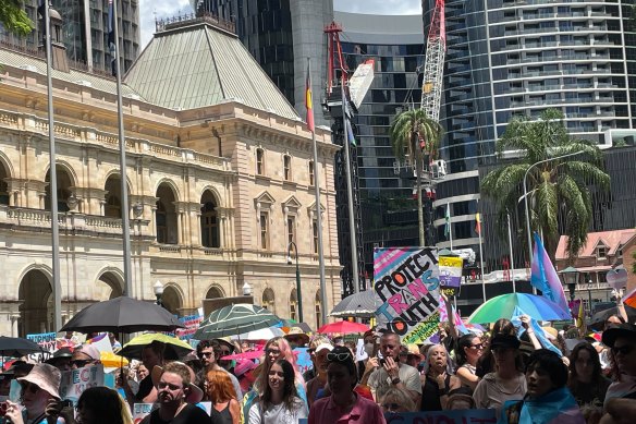 Protesters gathered outside Parliament House at a rally calling for the LNP to reinstate healthcare for trans youth in Brisbane on February 8.