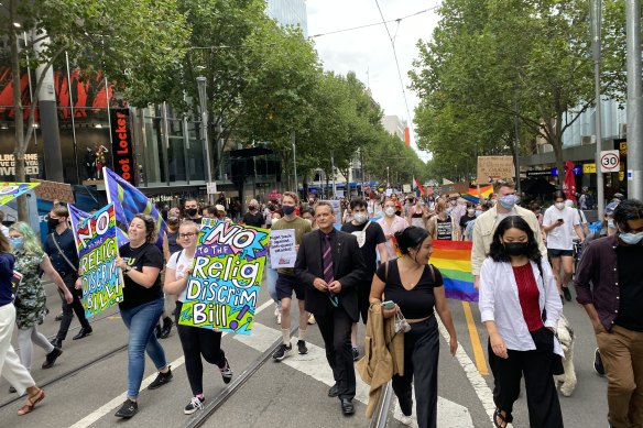 Demonstrators protesting the proposed religious discrimination bill march through Melbourne’s CBD on Wednesday afternoon.