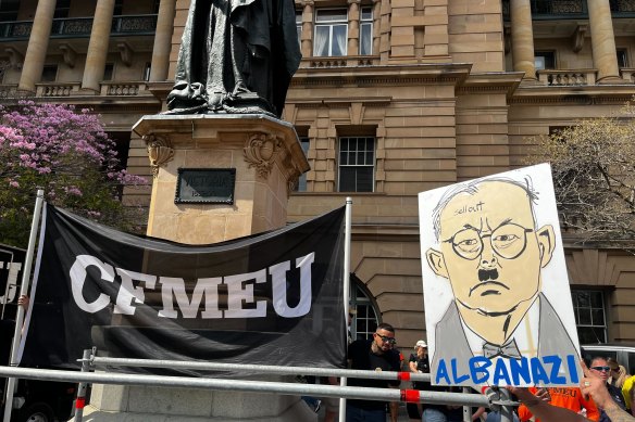 An “Albanazi” placard at Brisbane’s CFMEU protest.