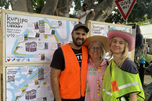 Resilient Kurilpa members (left to right) Sebastian Vanderzeil, Melinda McInturff and Paula Hardie with the Kurilpa Flood Library, which they use to engage and listen to local flood stories.