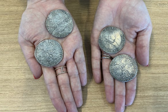 Four priceless silver coins from the 1629 shipwreck have been taken from a diver in Queensland.