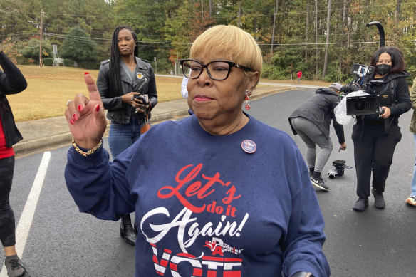 The all-important African-American voter has not been energised, Democrats say. Pictured: an organiser at a black church event known as “Souls to the Polls” in Decatur, Georgia. 