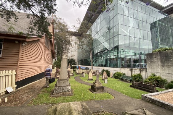 Some of the remaining 24 headstones behind Milton’s Christ Church are squeezed into a tiny portion of land beside Suncorp Stadium.