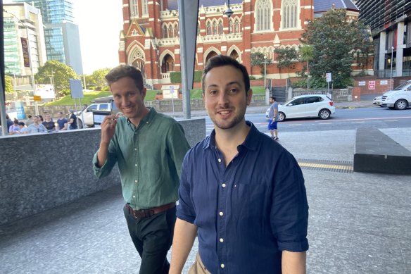 Greens winner Stephen Bates (right) walks to the press conference with the party’s successful Griffith candidate, Max Chandler-Mather, at Brisbane’s King George Square on Saturday afternoon.