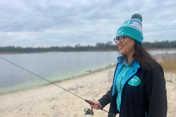 Leanne Ngo is a member of Women in Recreational Fishing and is excited about the thousands of fish being released before the school holidays.
