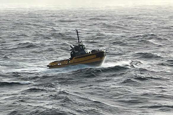 A vessel seen from the Pacific Adventure during the search for a missing passenger.