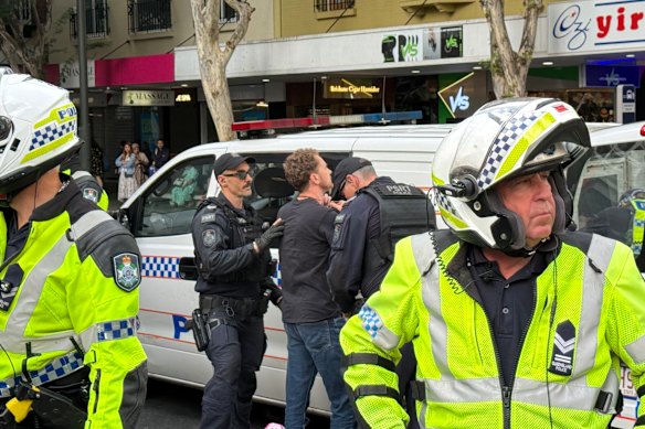 Police arrested six people at the rally in Brisbane’s CBD.