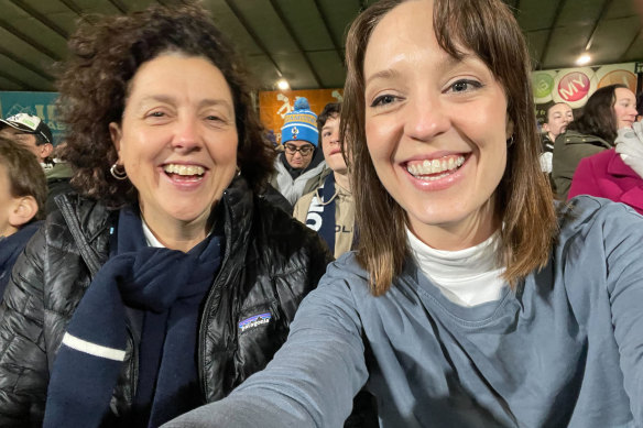 In happier times: Kooyong MP Monique Ryan and her then-chief of staff, Sally Rugg, at an AFLW game.