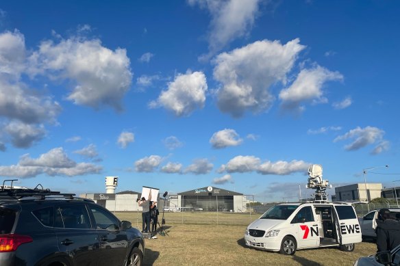 Media wait for the body to land. 