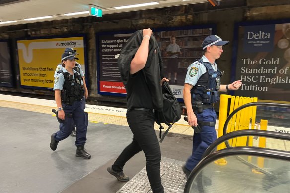 Police questioned men wearing black at North Sydney train station on Australia Day.