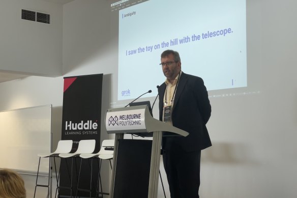 Dr James Curran making a presentation in 2023.