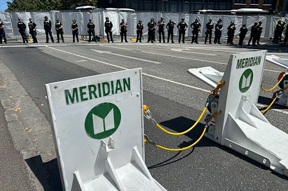 Police have set up a protective barricade  as protesters vow to disrupt Herzog’s visit. 