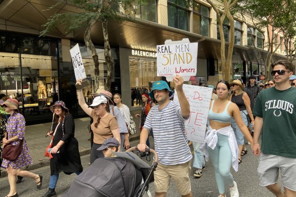 Thousands of protesters march down Brisbane's Adelaide Street as part of one of the largest gatherings since the Black Lives Matter protests of 2020.