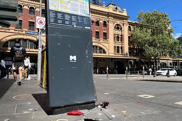 Debris on Elizabeth Street at the intersection with Flinders Street after the incident. 