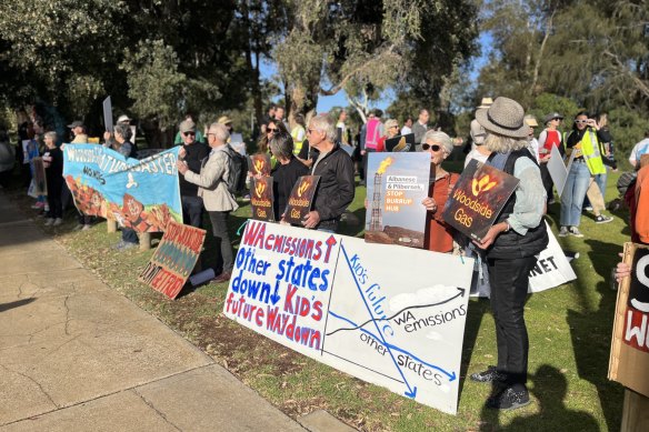Protesters at Woodside’s AGM on Wednesday morning. 
